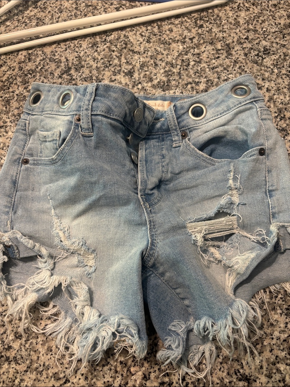 Altar'd State Light Blue Distressed Denim Shorts with Grommet Waist